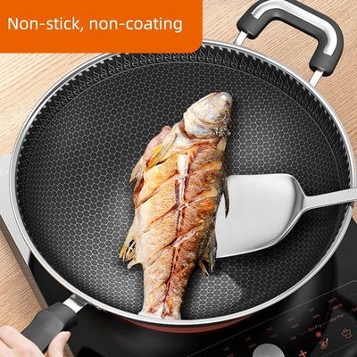 Revestimento interno antiaderente Wok de aço inoxidável com aquecimento rápido e modelos personalizáveis