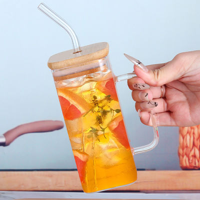 Garrafa de água potável de vidro de 350 ml personalizada com tampa de grãos de madeira e forma quadrada